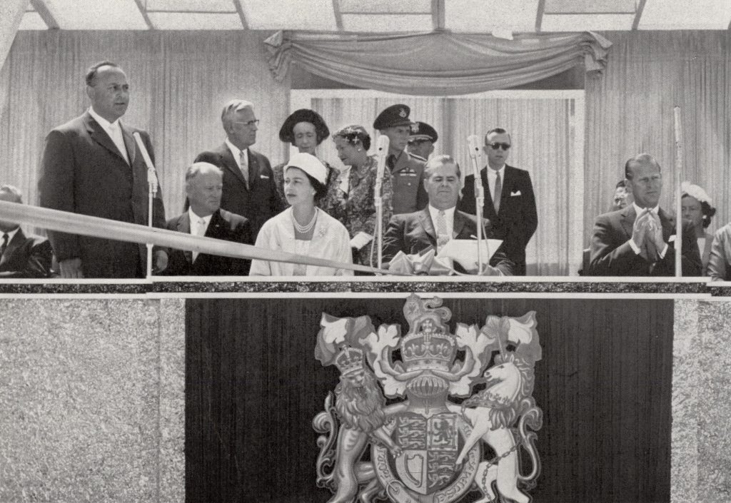 1959 - Peter Kiewit (back row left) at his first of two meetings with Queen Elizabeth II (front row center).