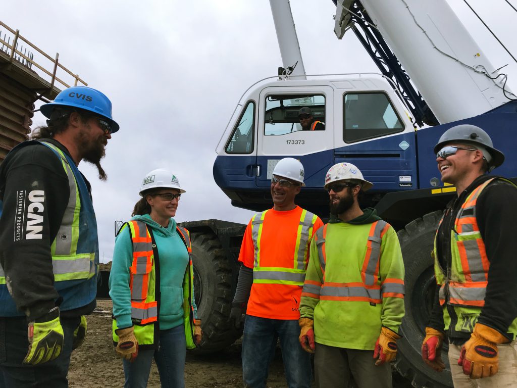 “Working out on a project is a completely different lifestyle and you have more of a team environment,” said Katie Allan, seen above with Scott Wallace, Johnny Jones, Gordon Gregory, Jonathan Bontos-Brodeau and Spencer White. All are part of the team working on the Southwest Calgary Ring Road project in Calgary, Alberta. 