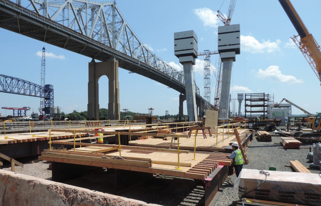 The new Goethals Bridge begins to come into view next to the nearly 90-year-old original structure.