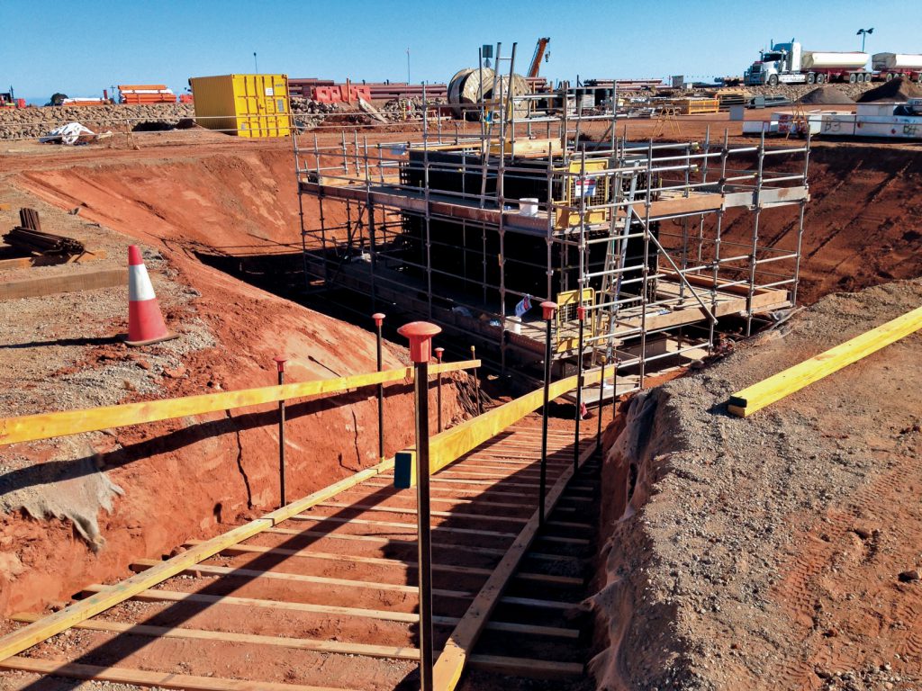 Construction of a deep sump pit at the temporary utilities plant will allow for the treatment and distribution of potable and fire water to the LNG site.