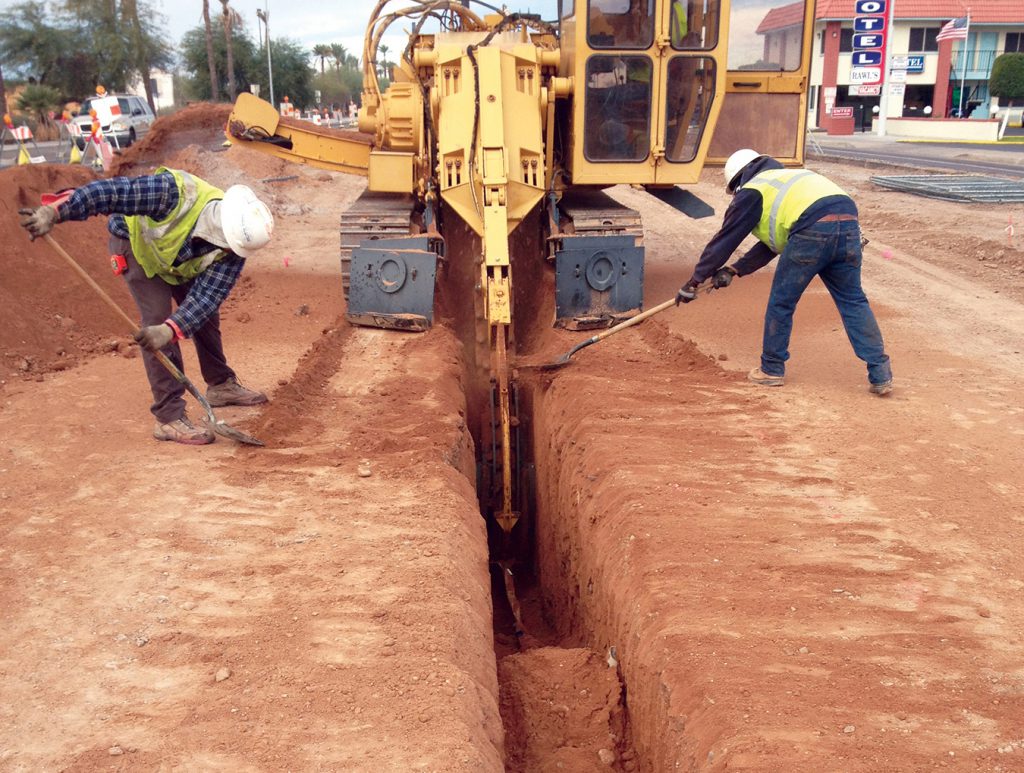 A trench is formed to prepare for the installation of the communication ductbank.