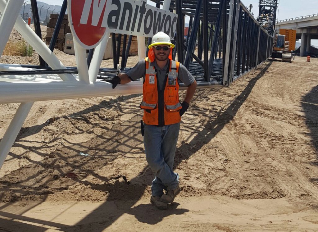 Michael Music (University of Toledo) – shown helping with the disassembly of a 300-ton crane – said the most valuable lessons he learned while interning on the Border West Expressway in Texas had to do with safety, teamwork, and honesty.