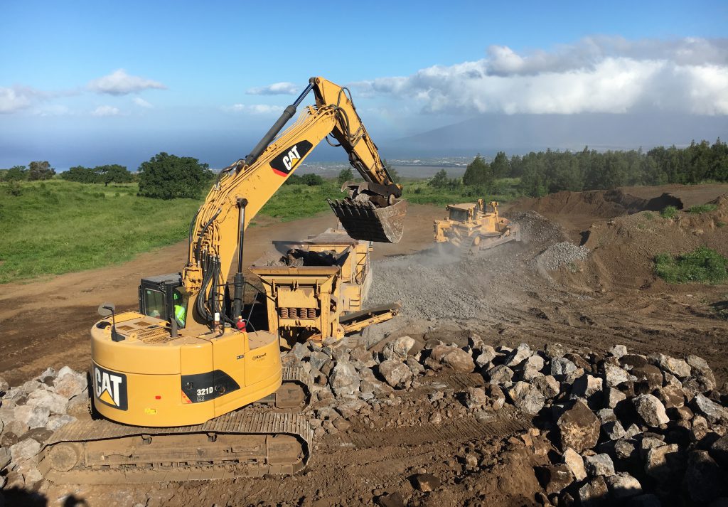 A crushing operation takes place in Hawaii using Kiewit-owned equipment.