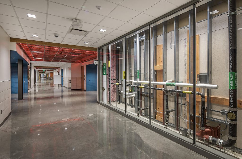 In the new Construction Education Center (CEC) even the building is a teaching tool. Plumbing, utilities, electrical and mechanical systems are all visible through interior glass and lighting.
