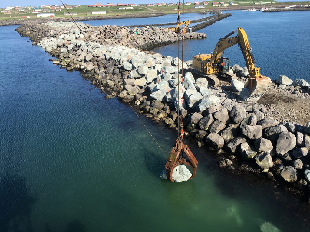 More than 32,000 cubic yards of armor stone and scour rock were placed on the breakwater repairs. 