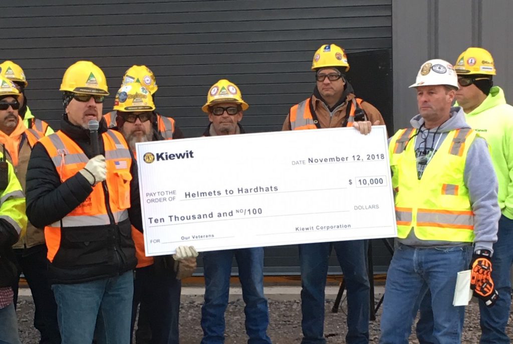 Kiewit presents a $10,000 donation to Helmets to Hardhats in honor of Veterans Day.