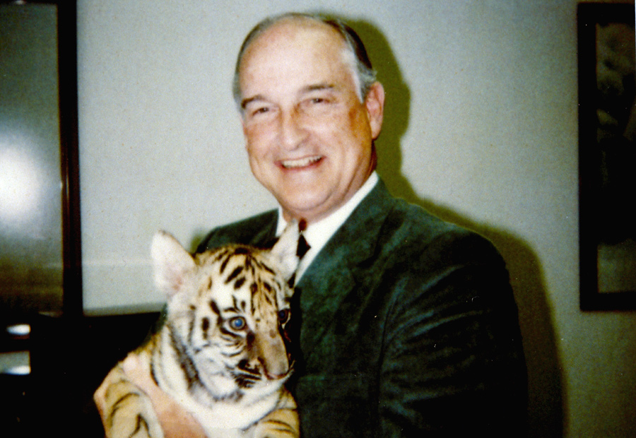 Among his many philanthropic endeavors, Walter’s greatest love was Omaha’s Henry Doorly Zoo & Aquarium. He loved the animals and interacting with them, as shown in the photos above where he is holding a young gorilla and tiger.