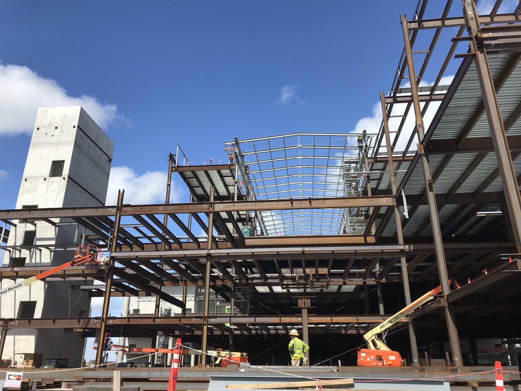 Crews construct the new landside terminal building, which is estimated to accommodate 10 to 12 million travelers annually.  