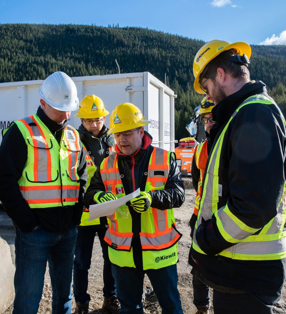 Kiewit Engineering Operations Director Jorge Antunes shares project plans with B.C. Ministry of Transportation and Infrastructure Engineering Director Kevin Weicker.