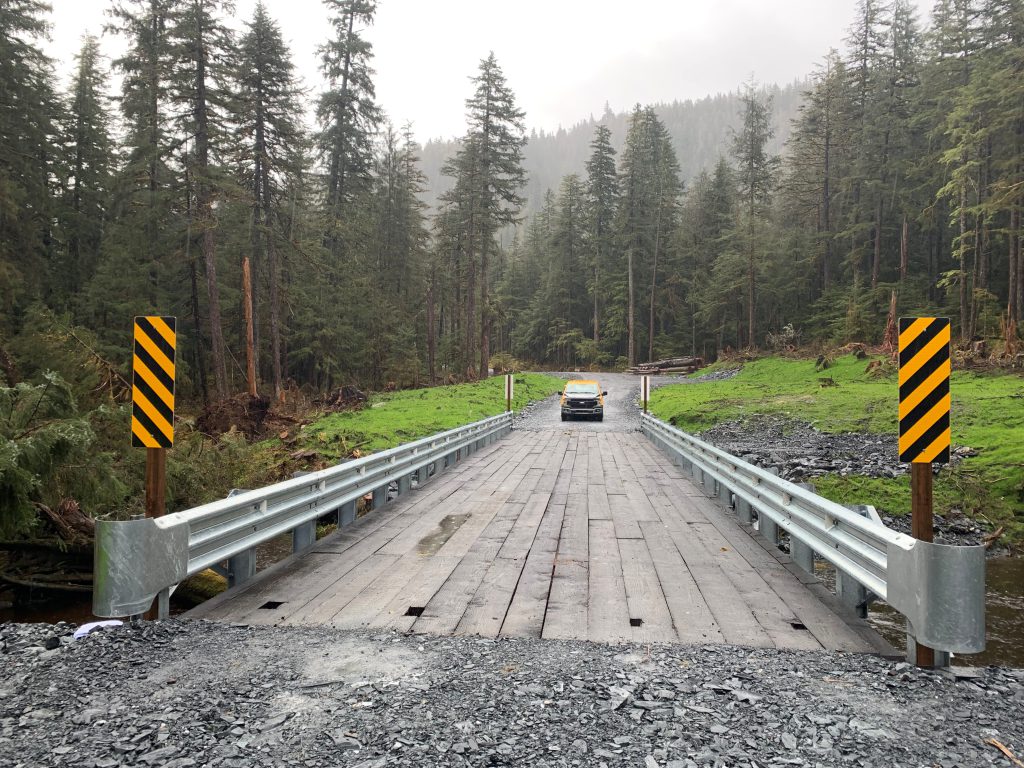Although serving a small population, a Kiewit team makes a big impact by constructing a year-round access road through a remote Alaskan island. 