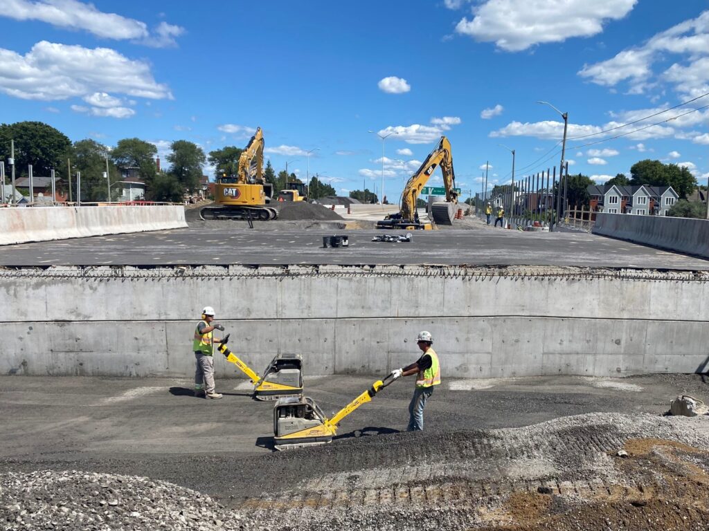 Crews at work during the ongoing paving operations