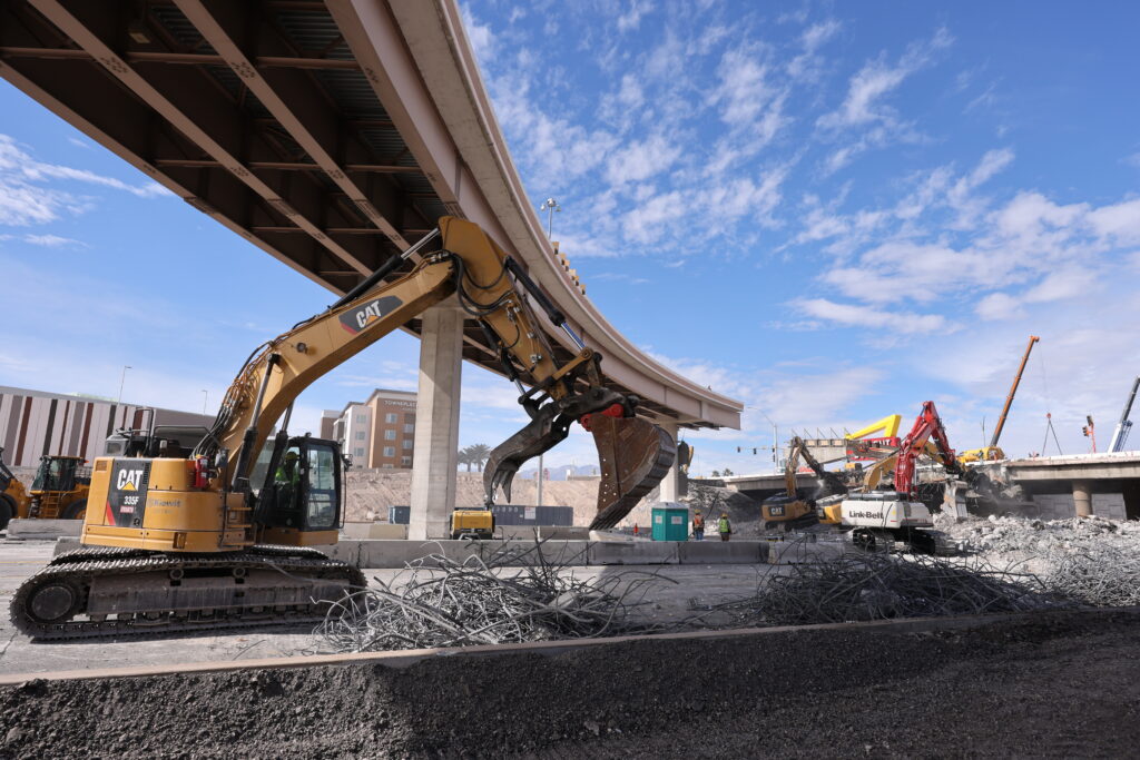 Kiewit crews demolished the bridge during two full weekends of I-15 closures, working around the clock to process the existing concrete and remove reinforced steel.