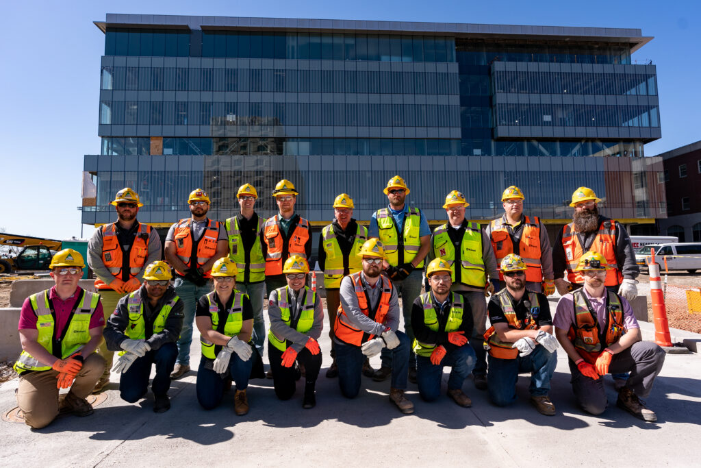 The glass panels were pre-assembled off-site and then installed piece-by-piece to the exterior of all six floors. This system streamlined the construction process.