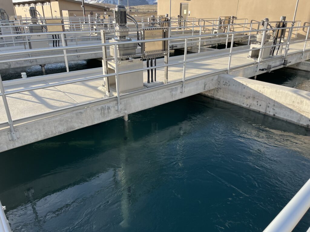 Flocculation basins are connected by concrete baffle walls with sedimentation basins.