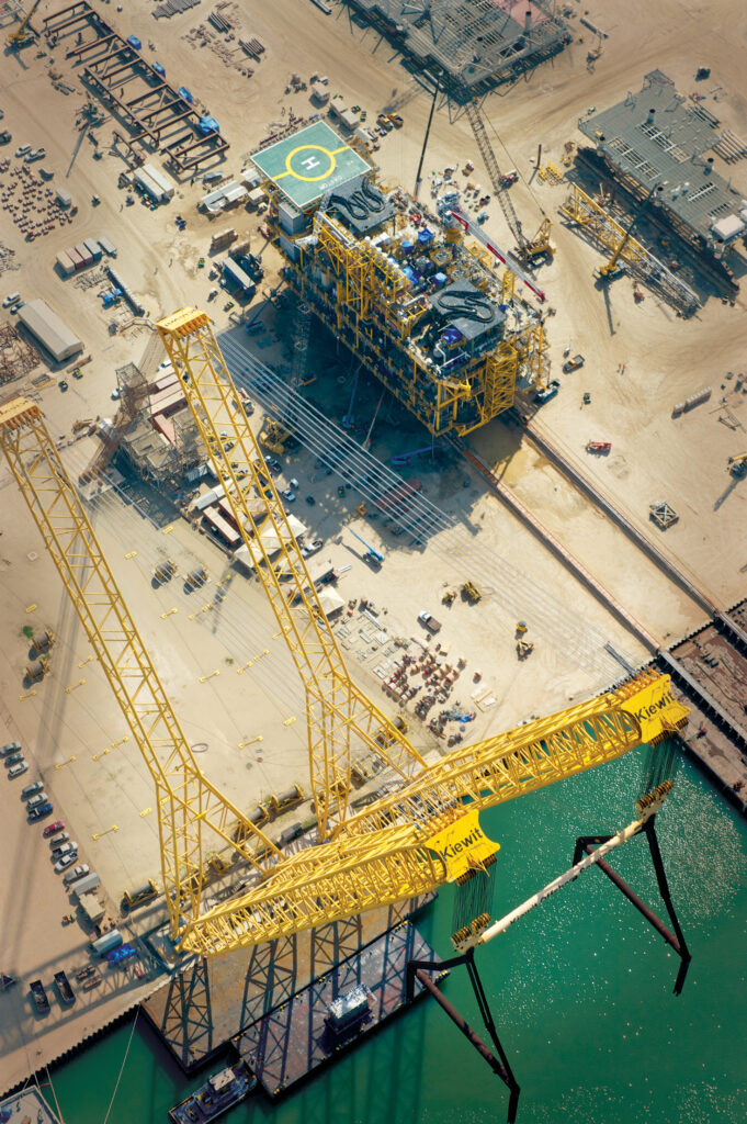 Kiewit’s heavy lifting device (HLD) prepares to load out a fully integrated offshore topside at its Ingleside Yard.