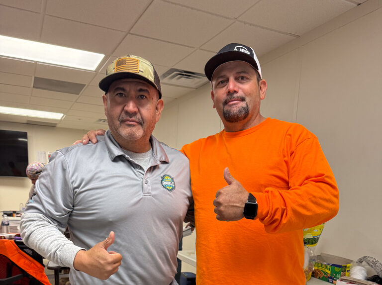 Ironworking Instructor Hugo Mosqueda (left) celebrated with Francisco Ozaeta Jr. after Ozaeta completed his first AJDP course — a major step in his ironworking career.